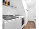 Convenient laundry room with front load washer and dryer hookups and storage shelves at 12105 Fall Ct, Indianapolis, IN 46229
