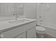 A full bathroom features a shower/tub combo and single sink vanity at 12500 Morning Ridge Way, Noblesville, IN 46060