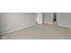 Spacious bedroom featuring neutral carpet and paint, conveniently located near the ensuite bathroom at 12500 Morning Ridge Way, Noblesville, IN 46060