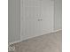 Bedroom with double door closet and neutral colored carpet at 12500 Morning Ridge Way, Noblesville, IN 46060