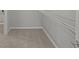 A walk-in closet with vinyl wood look flooring and wire shelving at 12500 Morning Ridge Way, Noblesville, IN 46060