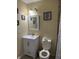 Well-lit bathroom featuring a vanity with modern fixtures, toilet, and shower/tub combination, and mirror at , Indianapolis, IN 46241