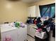 Laundry room featuring a washer and dryer and storage for laundry supplies and organization at , Indianapolis, IN 46241