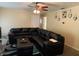 Comfortable living room with neutral walls, carpet, ceiling fan and a large sectional couch for relaxing at , Indianapolis, IN 46241