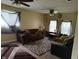 Spacious living room with two sofas, ceiling fans and large windows providing ample natural light at , Indianapolis, IN 46241