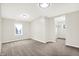 Spacious empty bedroom with neutral walls and carpeting, includes a window and walk-in closet for ample storage at 1338 N Parker Ave, Indianapolis, IN 46201