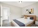 Bright bedroom with a stylish bed, neutral walls, and complementary decor creates a soothing and comfortable atmosphere at 1338 N Parker Ave, Indianapolis, IN 46201