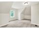 Empty bedroom featuring neutral walls and carpeting, offering a versatile space ready for personalization and design at 1338 N Parker Ave, Indianapolis, IN 46201