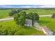 An aerial view shows this property's location among rolling fields and farms at 14855 E State Road 46, Columbus, IN 47203