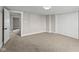 Spacious bedroom featuring neutral carpet, a large closet, and ample natural light at 14855 E State Road 46, Columbus, IN 47203