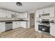 Well-lit kitchen with stainless steel appliances and plenty of cabinet space at 14855 E State Road 46, Columbus, IN 47203