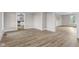 Spacious living room featuring light-colored wood floors and neutral walls at 14855 E State Road 46, Columbus, IN 47203