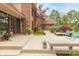 Spacious backyard deck surrounded by lush landscaping, perfect for outdoor entertaining and dining at 1497 N 200 W, Greenfield, IN 46140