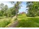Beautiful backyard with river access, perfect for nature lovers and outdoor activities at 1497 N 200 W, Greenfield, IN 46140