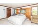 Inviting bedroom with built-in storage, comfortable seating, and natural light at 1497 N 200 W, Greenfield, IN 46140