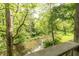 Amazing forest view from the home features a flowing creek in a natural and secluded setting at 1497 N 200 W, Greenfield, IN 46140
