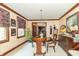 Cozy dining room with wooden table and chairs, natural light, and decorative accents at 1497 N 200 W, Greenfield, IN 46140