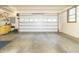 Spacious garage with ample room for parking and storage, perfect for car enthusiasts or hobbyists at 1497 N 200 W, Greenfield, IN 46140
