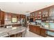 Spacious kitchen featuring stainless steel appliances, granite counters, and plenty of cabinet storage at 1497 N 200 W, Greenfield, IN 46140
