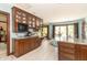 Open concept kitchen featuring custom cabinetry, granite countertops, and access to breakfast nook at 1497 N 200 W, Greenfield, IN 46140