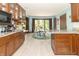 Bright kitchen features marble countertops and opens to the breakfast nook with floor to ceiling windows at 1497 N 200 W, Greenfield, IN 46140