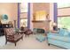 Comfortable living room with a brick fireplace, comfortable seating, and a piano at 1497 N 200 W, Greenfield, IN 46140