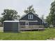 Spacious backyard with shed, deck, and ample space for outdoor activities at 1501 California St, Columbus, IN 47201
