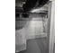 Unfinished basement with concrete walls, exposed beams, and visible ductwork at 1501 California St, Columbus, IN 47201