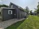 Exterior view of a home with gray siding, and a well manicured lawn at 1501 California St, Columbus, IN 47201