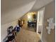 Charming attic bedroom with sloped ceilings and an open layout at 1510 Chester St, Anderson, IN 46012