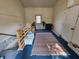 Unfinished room with carpet, natural light, and potential at 1510 Chester St, Anderson, IN 46012