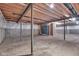 Unfinished basement featuring concrete floor, support beams, and plastic covered walls at 15359 Manning Way, Westfield, IN 46074