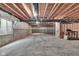 Spacious unfinished basement with concrete floor and exposed ceiling and support beams at 15359 Manning Way, Westfield, IN 46074