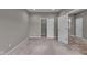 Spacious bedroom featuring neutral walls, carpet flooring, and an open doorway to the walk-in closet at 15359 Manning Way, Westfield, IN 46074