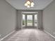 Bright dining room featuring a bay window allowing for an abundance of natural light and neutral carpeting at 15359 Manning Way, Westfield, IN 46074