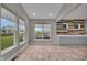 Spacious great room featuring large windows and stylish accent wall at 15359 Manning Way, Westfield, IN 46074