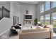 Staged living room with stylish furniture and a cozy fireplace, creating an inviting atmosphere at 15359 Manning Way, Westfield, IN 46074