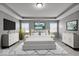 Stylishly furnished main bedroom with plush carpet, modern furniture, and natural light creating a serene retreat at 15359 Manning Way, Westfield, IN 46074