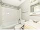 Standard bathroom with combination shower and tub with toilet and sink in the foreground at 1543 W 79Th St, Indianapolis, IN 46260