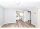 Spacious bedroom featuring wood laminate flooring, a vanity and a closet at 1543 W 79Th St, Indianapolis, IN 46260