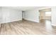 Spacious living room featuring contemporary flooring, light gray walls, and an inviting open layout at 1543 W 79Th St, Indianapolis, IN 46260
