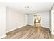 Bright living room featuring wood laminate flooring and neutral paint at 1543 W 79Th St, Indianapolis, IN 46260