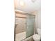 Bathroom shower stall with glass door with a toilet next to the shower at 1543 W 79Th St, Indianapolis, IN 46260