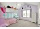 Charming bedroom featuring a loft bed, vanity, and plenty of natural light from the window at 1808 Woodfield Dr, Greenwood, IN 46143