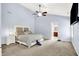 Large main bedroom with vaulted ceiling, carpet, ceiling fan and ensuite access at 1808 Woodfield Dr, Greenwood, IN 46143