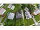 Bird's eye view showcases the property's layout, including the house, yards, and surrounding neighborhood at 1837 Bauer Rd, Indianapolis, IN 46218