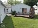 Cozy deck area with outdoor seating, plants and privacy fence at 1837 Bauer Rd, Indianapolis, IN 46218
