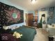 Vibrant bedroom featuring a unique tapestry and comfortable decor for a personalized space at 1837 Bauer Rd, Indianapolis, IN 46218