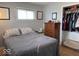 Serene bedroom with a closet, natural light, and calming gray walls for restful sleep at 1837 Bauer Rd, Indianapolis, IN 46218
