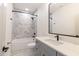 Bathroom featuring modern vanity, sleek fixtures, and marble tile at 2051-2053 Columbia Ave, Indianapolis, IN 46202